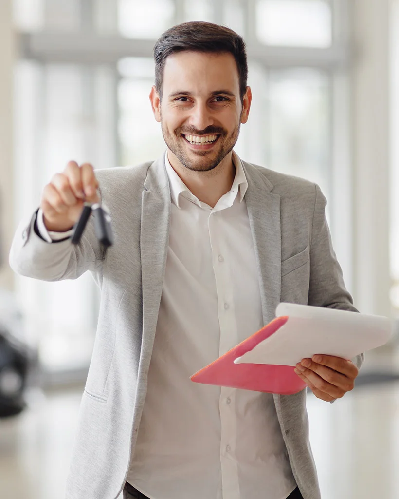 salesperson-workin-at-car-dealership salesperson-workin-at-car-dealership